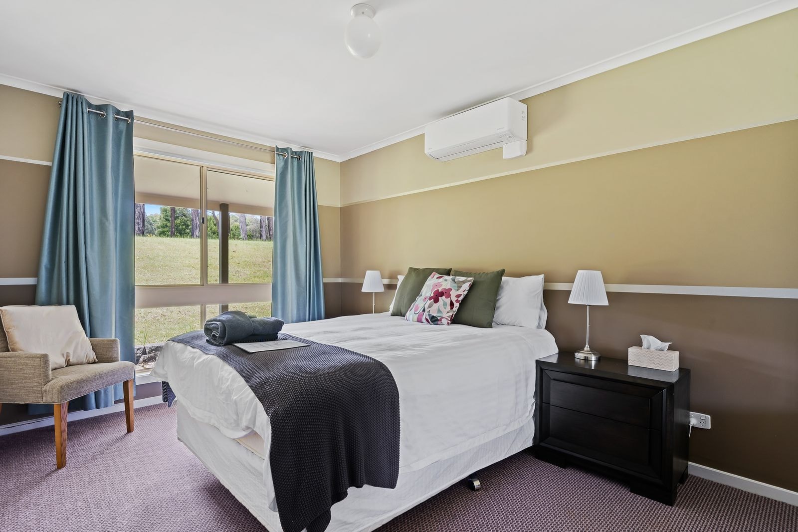 A guest bedroom looking out onto the garden