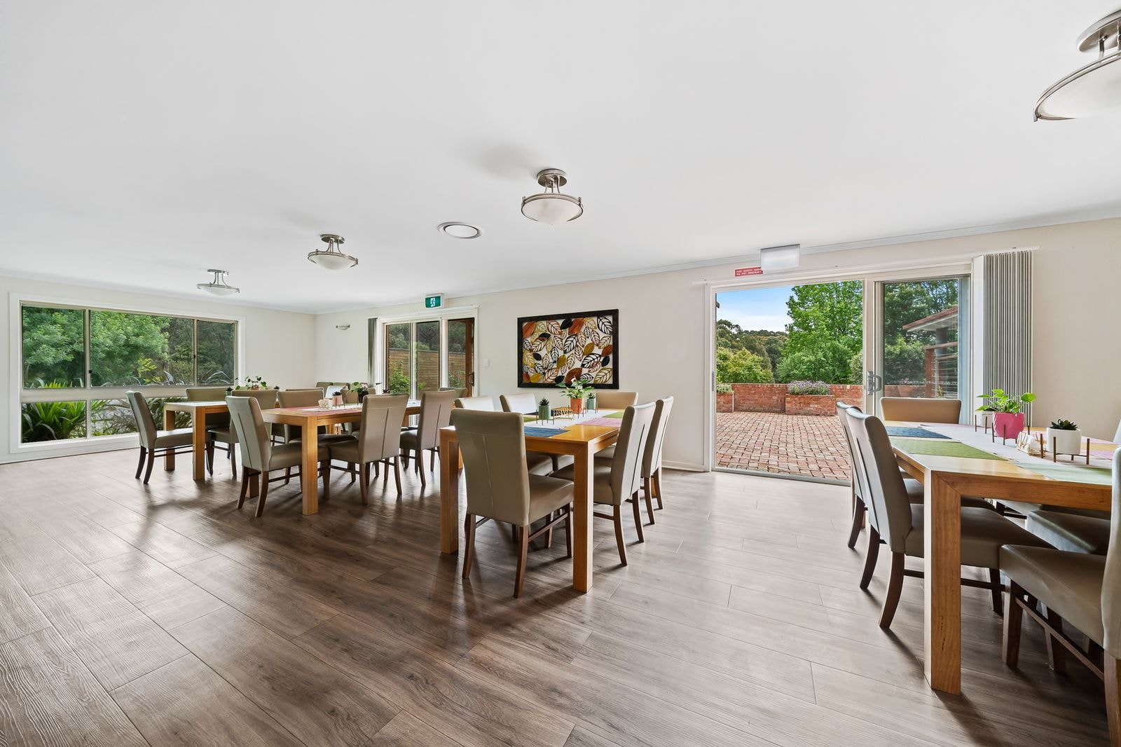 The shared dining room looking out over the gardens